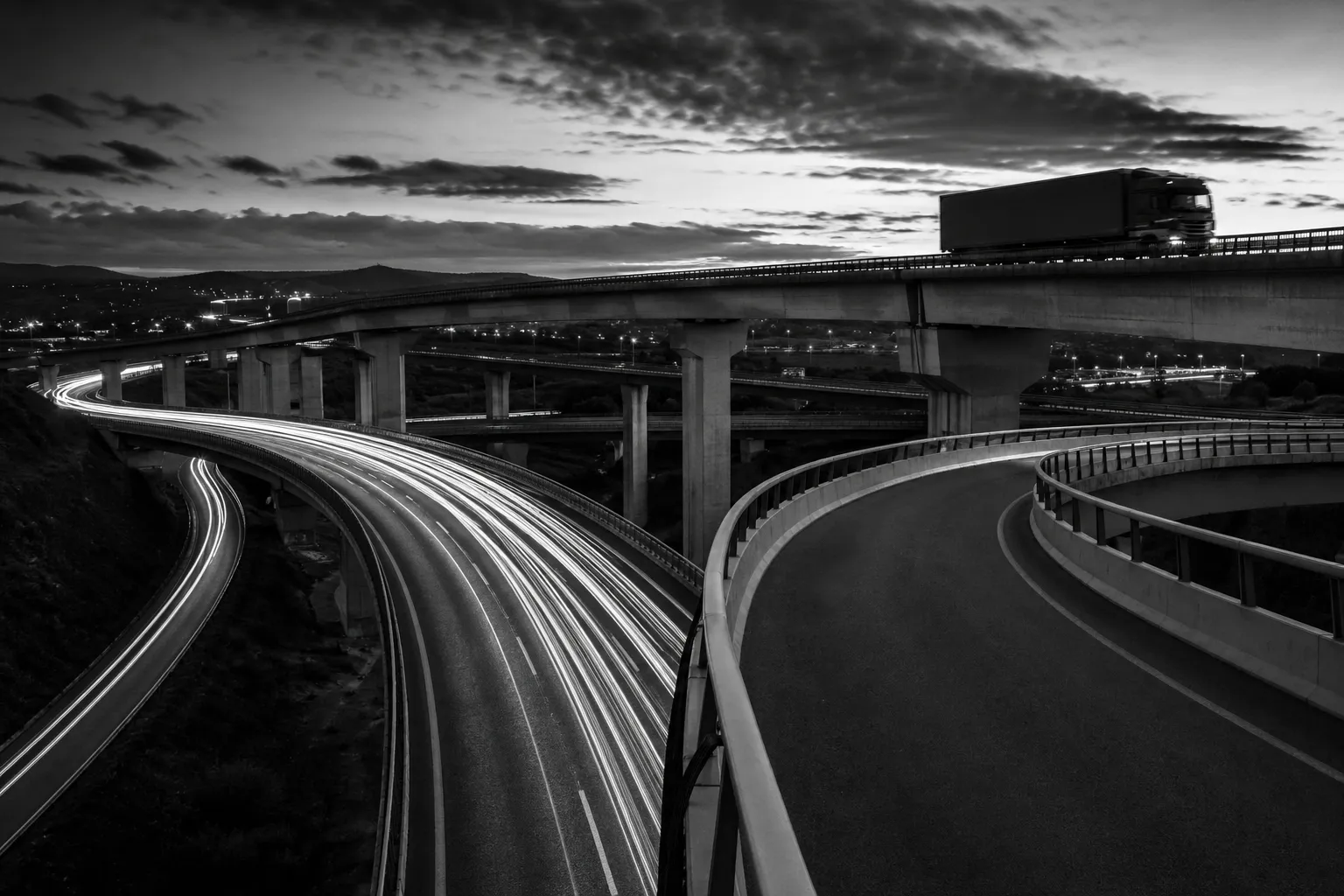 European highway interchange and freight corridor, monochrome atmospheric treatment
